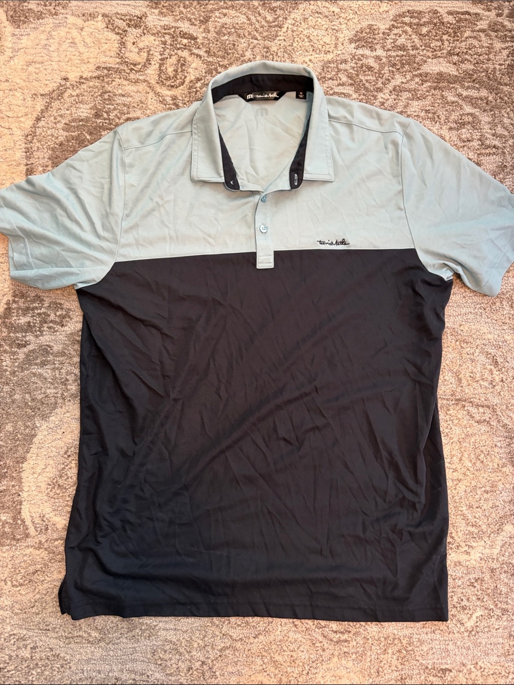 Travis Mathew Two-Tone Polo in Light Blue and Black